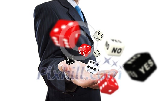 Close up of businessman throwing dice. Gambling concept