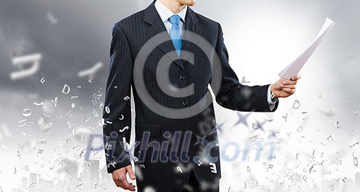 Close up of businessman with papers in hands Close up of businessman with papers in hands
