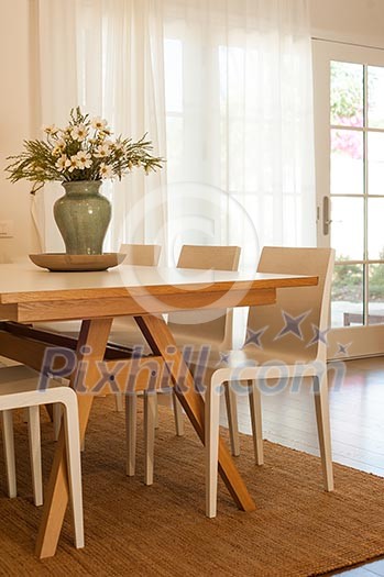 Close up of a wooden dining table Close up of a wooden dining table
