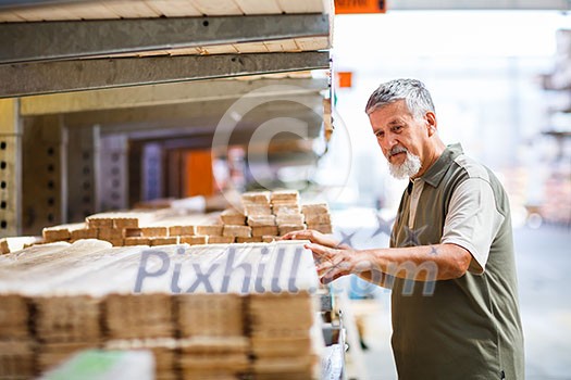 Man buying construction wood in a DIY store Man buying construction wood in a DIY store