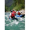 white water rafting (motion blur is used to convey rapid flow of the river/movement of the raft boat)