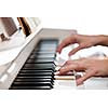 Playing Piano (shallow DOF; color toned image)