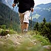 Active senior hiking in high mountains (Swiss Alps)