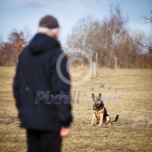 Master and his obedient (German Shepherd) dog Master and his obedient (German Shepherd) dog