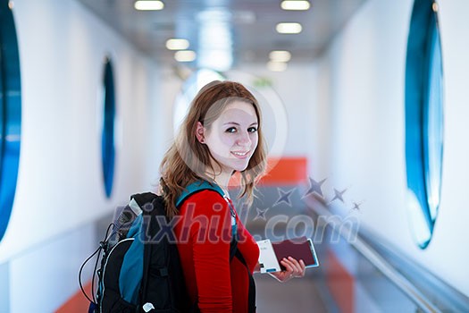 Portrait of a young woman in the boarding bridge, boarding an aircraft Portrait of a young woman in the boarding bridge, boarding an aircraft