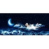 Young blond girl flying in night sky