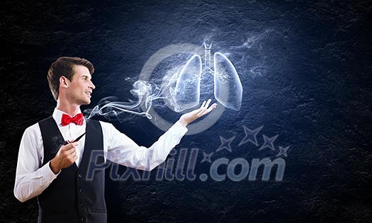Conceptual image of young handsome man smoking pipe Conceptual image of young handsome man smoking pipe