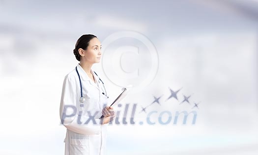 Young attractive woman doctor with stethoscope on neck Young attractive woman doctor with stethoscope on neck