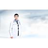 Young handsome doctor with stethoscope against white background