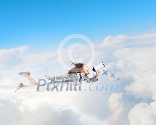 Young pretty businesswoman flying in blue sky Young pretty businesswoman flying in blue sky