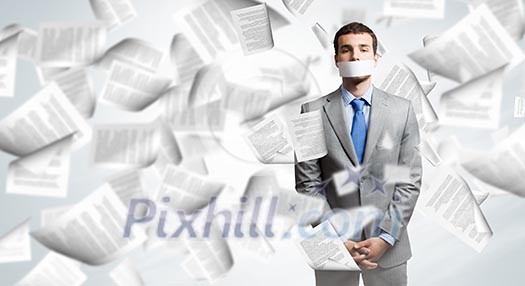 Young handsome businessman with adhesive tape on mouth Young handsome businessman with adhesive tape on mouth
