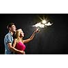 Conceptual image of young couple hugging each other and dreaming