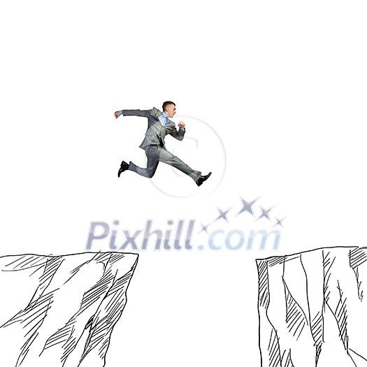 Young businessman jumping over drawn mountain gap Young businessman jumping over drawn mountain gap