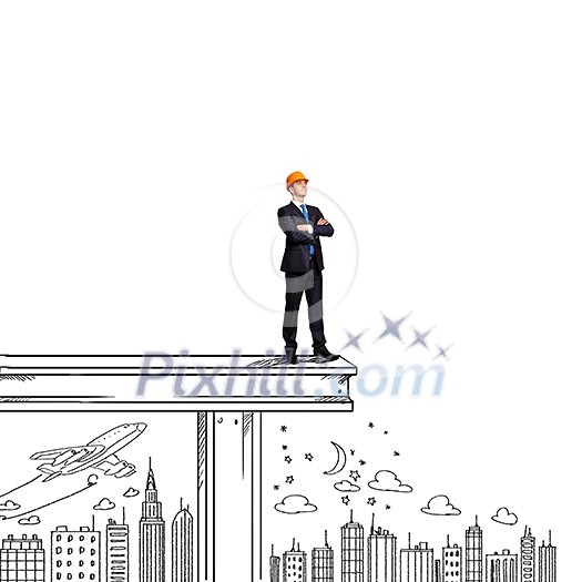 Businessman in helmet standing on construction beam Businessman in helmet standing on construction beam