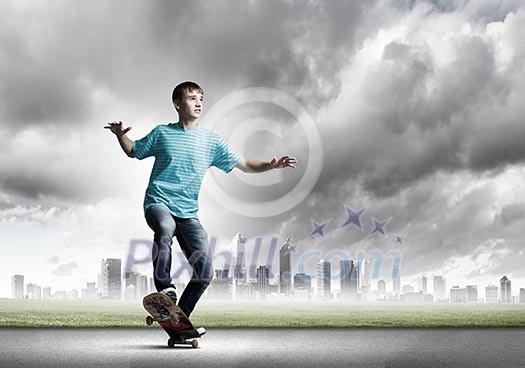 Skater in jeans riding on road against city background