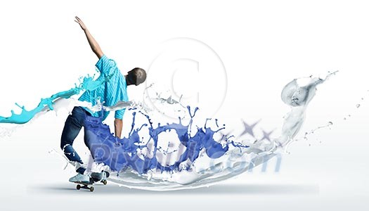 Boy skater riding on board against white background Boy skater riding on board against white background