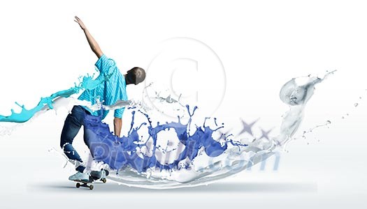 Boy skater riding on board against white background