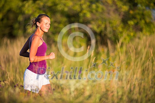 Young woman running outdoors on a lovely sunny day Young woman running outdoors on a lovely sunny day