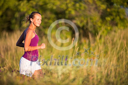 Young woman running outdoors on a lovely sunny day