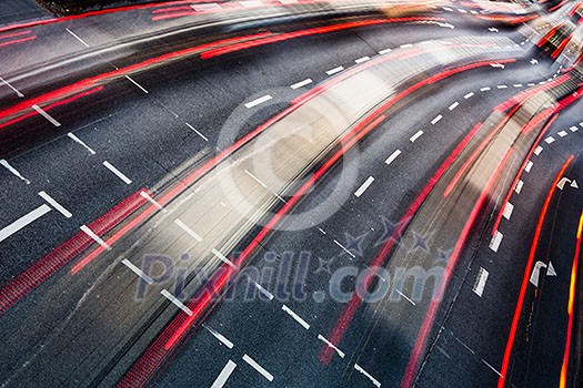 Motion blurred city road traffic (color toned image) Motion blurred city road traffic (color toned image)