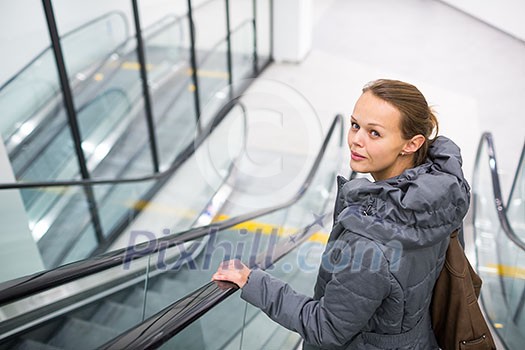 Young woman at a modern shopping center
