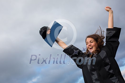 Pretty, young woman celebrating joyfully her graduation - spreading wide her arms, holding her diploma, savouring her success (color toned image; shallow DOF) Pretty, young woman celebrating joyfully her graduation - spreading wide her arms, holding her diploma, savouring her success (color toned image; shallow DOF)
