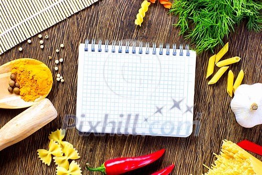 Chilli pepper macaroni herbs and splices on kitchen table Chilli pepper macaroni herbs and splices on kitchen table