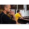 Handsome young man praying in a church