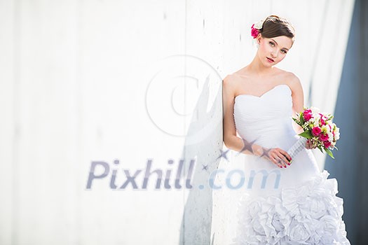 Gorgeous bride on her wedding day (color toned image; shallow DOF)