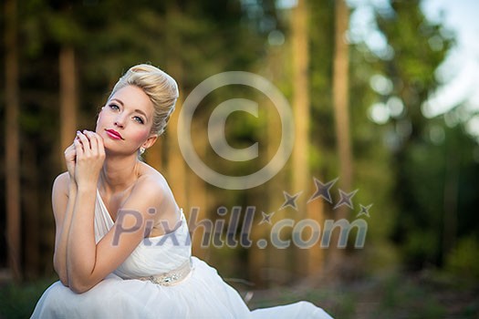 Lovely bride outdoors in a forest Lovely bride outdoors in a forest