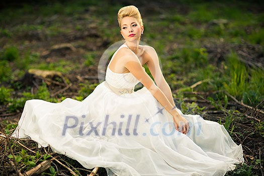 Lovely bride outdoors in a forest Lovely bride outdoors in a forest