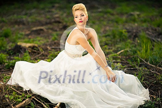 Lovely bride outdoors in a forest