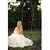 Lovely bride outdoors in a forest