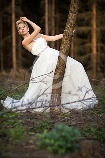 Lovely bride outdoors in a forest