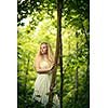 Lovely bride outdoors in a forest