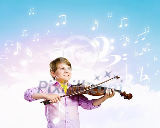 Image of little cute boy playing on violin against color background