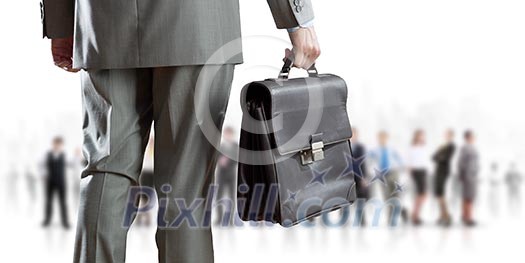 Back view of businessman with business team at background