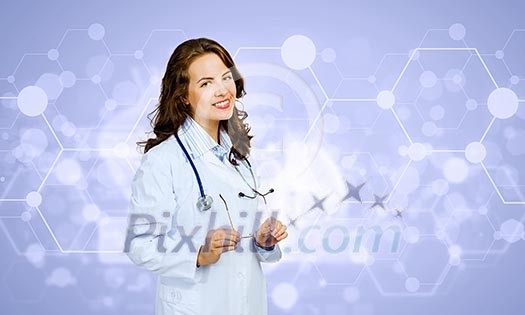 Image of young woman doctor against media background Image of young woman doctor against media background