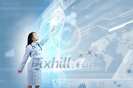 Image of young woman doctor touching icon of media screen Image of young woman doctor touching icon of media screen