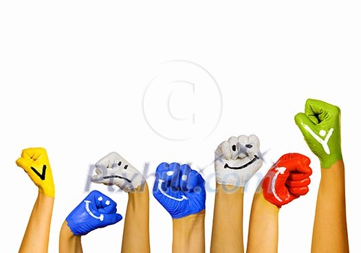 Image of human hands in colorful paint with smiles Image of human hands in colorful paint with smiles