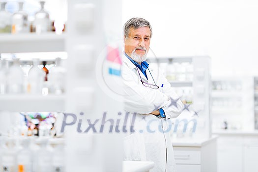 Senior male researcher carrying out scientific research in a lab (shallow DOF; color toned image) Senior male researcher carrying out scientific research in a lab (shallow DOF; color toned image)