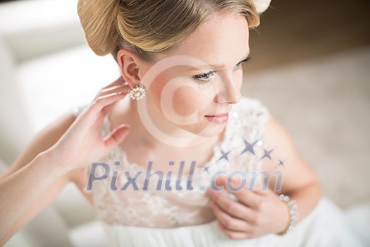 Gorgeous bride on her wedding day (color toned image; shallow DOF)