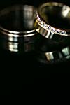 Wedding day details - two lovely golden wedding rings awaiting their moment, with some nice reflections