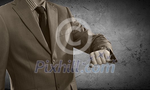 Close up of businessman looking at watch