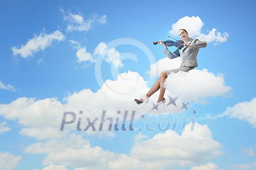 Young businesswoman sitting on cloud and playing violin