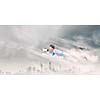 Young businessman with megaphone flying high in sky
