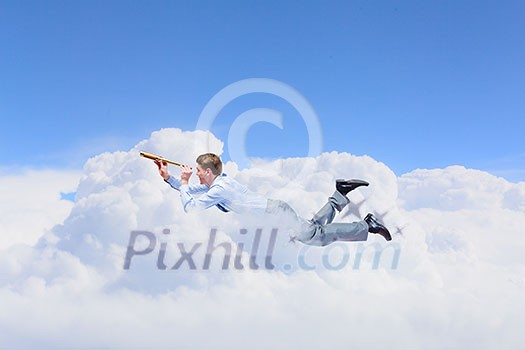 Young businessman flying in sky and lokking in spyglass Young businessman flying in sky and lokking in spyglass