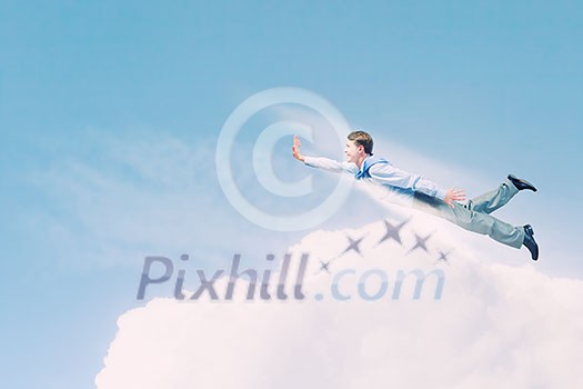 Young super businessman flying high in sky Young super businessman flying high in sky