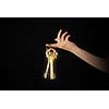 Close up of woman hand holding golden key