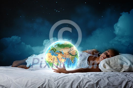 Cute girl sleeping in bed and looking at Earth planet. Elements of this image are furnished by NASA